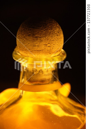 Empty Color Glass Bottle on the table 137721308