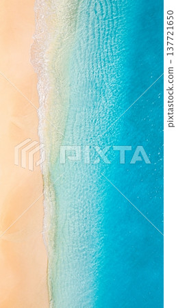 Radiant top view of tropical beach with golden sand, turquoise ocean waves, colorful umbrellas and sunbeds, serene summer vacation, idyllic mediterranean coastal paradise Radiant top view of tropical beach with golden sand, turquoise ocean waves, colorful umbrellas and sunbeds, serene summer vacation, idyllic mediterranean coastal paradise 137721650