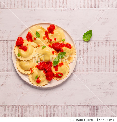 Ravioli with tomato sauce and basil Ravioli with tomato sauce and basil 137722464