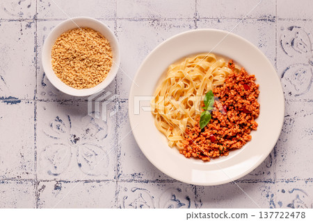 Vegan Bolognese Pasta with plant based minced meat. Vegan Bolognese Pasta with plant based minced meat. 137722478