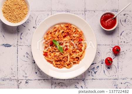 Vegan Bolognese Pasta with plant based minced meat. Vegan Bolognese Pasta with plant based minced meat. 137722482