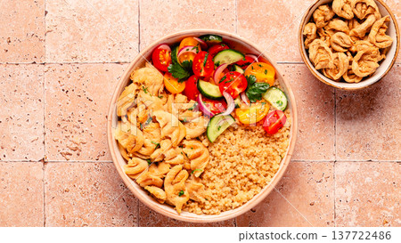 Bowl of quinoa with vegan soy meat and vegetables. Bowl of quinoa with vegan soy meat and vegetables. 137722486