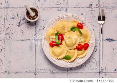 Ravioli with tomato sauce and basil Ravioli with tomato sauce and basil 137722499