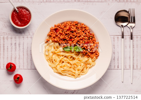 Vegan Bolognese Pasta with plant based minced meat. Vegan Bolognese Pasta with plant based minced meat. 137722514