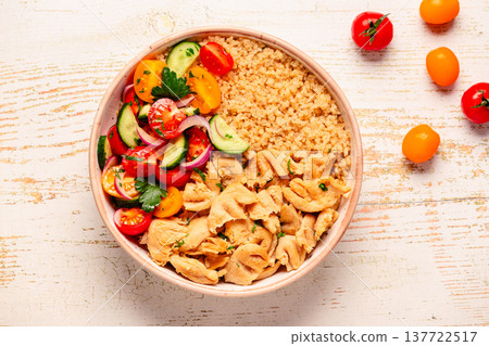 Bowl of quinoa with vegan soy meat and vegetables. 137722517