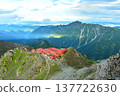 A view of Yarigatake Mountain Hut from the summit of Yarigatake in the Northern Alps. Kasagatake is visible in the distance. A view of Yarigatake Mountain Hut from the summit of Yarigatake in the Northern Alps. Kasagatake is visible in the distance. 137722630