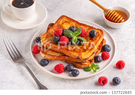 French toast with blueberries, raspberries, maple syrup French toast with blueberries, raspberries, maple syrup 137722685