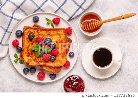 French toast with blueberries, raspberries, maple syrup French toast with blueberries, raspberries, maple syrup 137722686