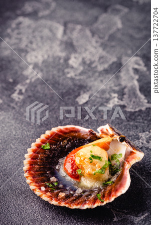 Cooked scallops with parsley Cooked scallops with parsley 137722704