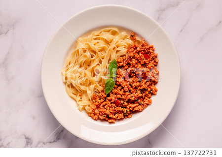 Vegan Bolognese Pasta with plant based minced meat. Vegan Bolognese Pasta with plant based minced meat. 137722731