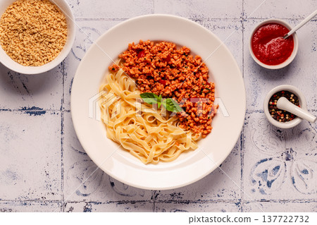 Vegan Bolognese Pasta with plant based minced meat. Vegan Bolognese Pasta with plant based minced meat. 137722732