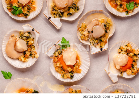 Cooked scallops with sauce Cooked scallops with sauce 137722781