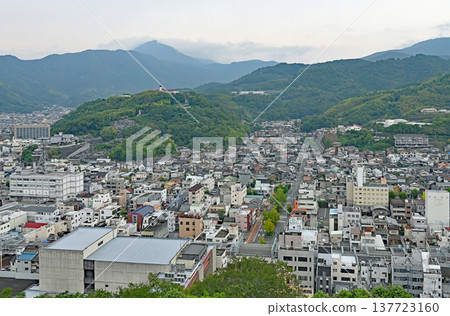 A panoramic view of the city of Uwajima, surrounded by mountains, as seen from the keep of the existing Uwajima Castle. A panoramic view of the city of Uwajima, surrounded by mountains, as seen from the keep of the existing Uwajima Castle. 137723160