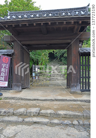 The tranquil scenery of the stone steps leading up to Uwajima Castle, a designated Important Cultural Property, and surrounded by lush greenery. The tranquil scenery of the stone steps leading up to Uwajima Castle, a designated Important Cultural Property, and surrounded by lush greenery. 137723190