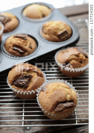 Freshly baked homemade chocolate chunk muffins (muffins made with pancake mix) 137724305