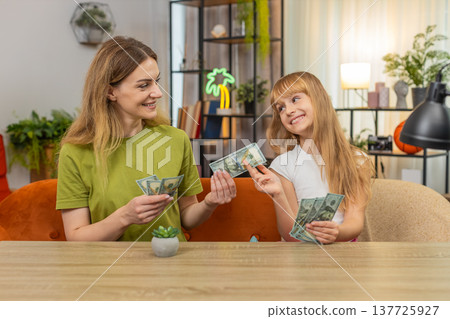 Mother daughter practice shop cashier buyer count change pay with card buy plant pot at table learn Mother daughter practice shop cashier buyer count change pay with card buy plant pot at table learn 137725927