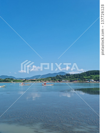 This is an island village with a view of the sea. This is an island village with a view of the sea. 137726128