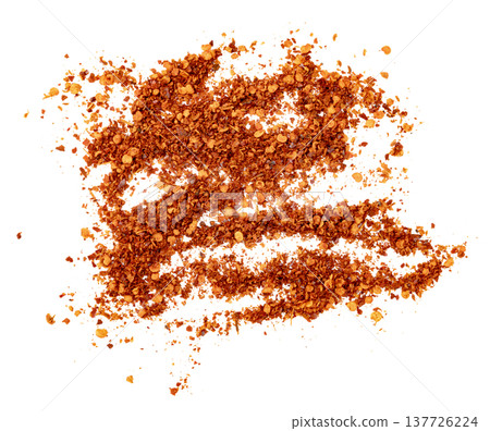 Pile of crushed red chili flakes and seeds scattered. Top view of spicy condiment powder used for cooking and seasoning. Isolated culinary ingredient for food design. Pile of crushed red chili flakes and seeds scattered. Top view of spicy condiment powder used for cooking and seasoning. Isolated culinary ingredient for food design. 137726224