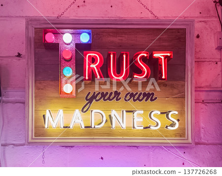 Trust your own madness neon sign display at Gods Own Junkyard, London, UK Trust your own madness neon sign display at Gods Own Junkyard, London, UK 137726268