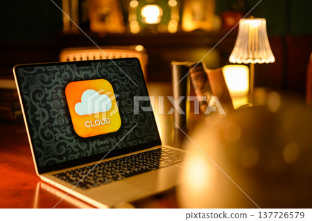 Cloud icon displayed on laptop Cloud icon displayed on laptop 137726579
