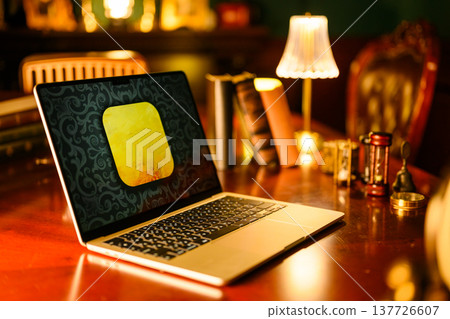 Yellow icon displayed on the laptop Yellow icon displayed on the laptop 137726607