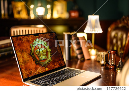 A laptop in a luxurious study A laptop in a luxurious study 137726622