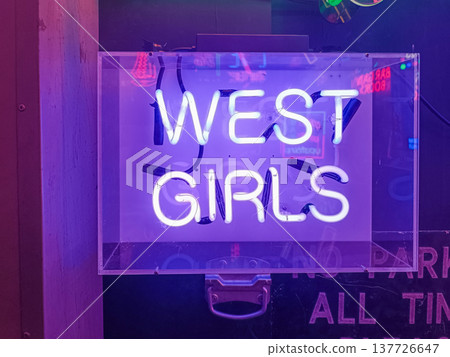 West girls neon sign display at Gods Own Junkyard in London, UK 137726647