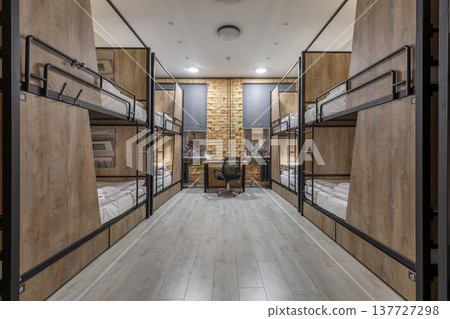 Symmetrical Hostel Dormitory with Rows of Modern Bunk Beds 137727298