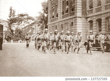 Old photo: Japanese Army marching into Shanghai during the Sino-Japanese War in 1937 Old photo: Japanese Army marching into Shanghai during the Sino-Japanese War in 1937 137727395