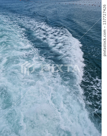 It's a water spray that forms along the ship's path. 137727426