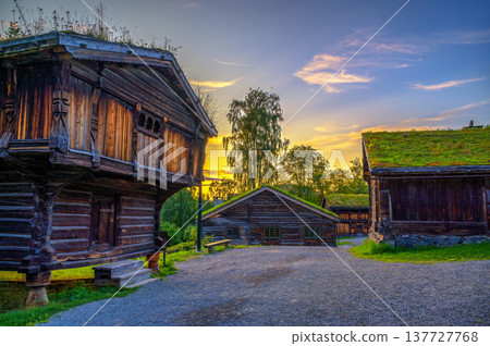 Sunset Over Historic Wooden Houses in Maihaugen, Lillehammer, Norway Sunset Over Historic Wooden Houses in Maihaugen, Lillehammer, Norway 137727768