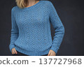 A girl wearing colorful knitwear. Fashionable design, modeling sample. 137727968