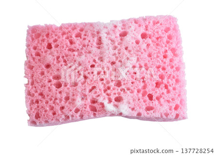 A pink porous sponge designed for household purposes. A pink porous sponge designed for household purposes. 137728254