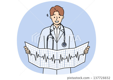 Man cardiologist holds result of ecg and smiles, standing in white coat with stethoscope around neck 137728832