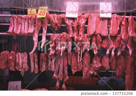 Pork sold at a butcher shop in the Hong Kong market. Higher and more expensive than beef and chicken. Chinese love pork Pork sold at a butcher shop in the Hong Kong market. Higher and more expensive than beef and chicken. Chinese love pork 137731208