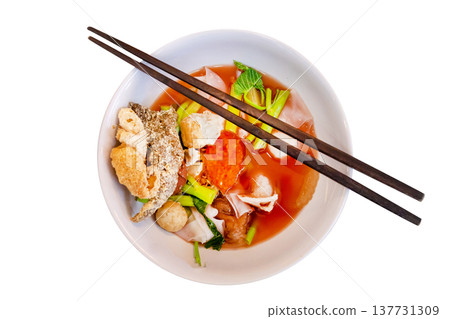 Top view of Yentafo Pink seafood flat noodles with fish meatballs, focus selective Top view of Yentafo Pink seafood flat noodles with fish meatballs, focus selective 137731309