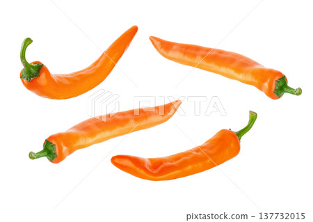 Set of fresh orange chili peppers isolated on white background, different angles. Set of fresh orange chili peppers isolated on white background, different angles. 137732015