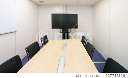 A bright conference room with a large monitor. A bright conference room with a large monitor. 137732110