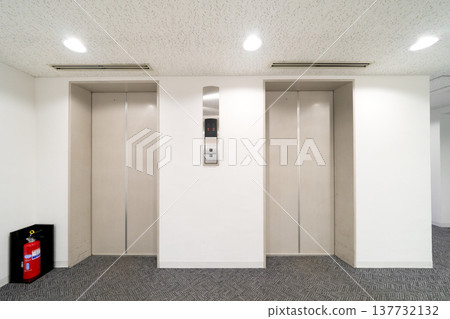 A clean elevator lobby in an office building A clean elevator lobby in an office building 137732132