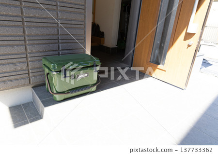 Cooler box placed in the entrance Cooler box placed in the entrance 137733362