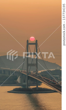 Dense Waterfront Skyline Overlooking Busy Harbour Beside Mountains Feb 21 2026 137734195
