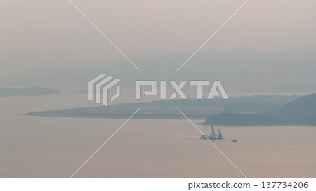 Coastal Lantau Bay Overlooking Industrial Piers And Green Hills Feb 21 2026 137734206