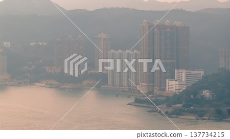 Coastal Community Overlooking Mountains, Towers, And Industrial Waterfront Feb 21 2026 Coastal Community Overlooking Mountains, Towers, And Industrial Waterfront Feb 21 2026 137734215