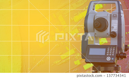 Geodetic instrument on the background of a residential area in the form of a project. Geodesy in construction and design 137734341