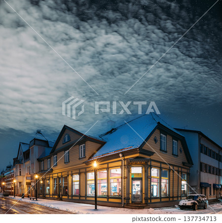 Illuminated Nikolai street in Parnu Old Town with festive Christmas lights on a winter night 137734713
