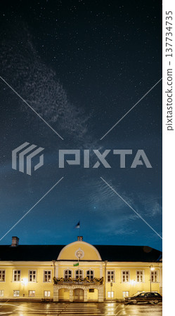 Kuressaare Town Hall with festive Christmas illumination under a starry sky at winter night Kuressaare Town Hall with festive Christmas illumination under a starry sky at winter night 137734735
