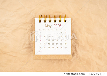 May 2026 mini desk calendar on old paper. May 2026 mini desk calendar on old paper. 137735410