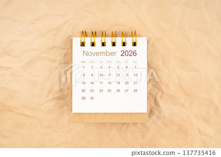 November 2026 mini desk calendar on old paper. November 2026 mini desk calendar on old paper. 137735416