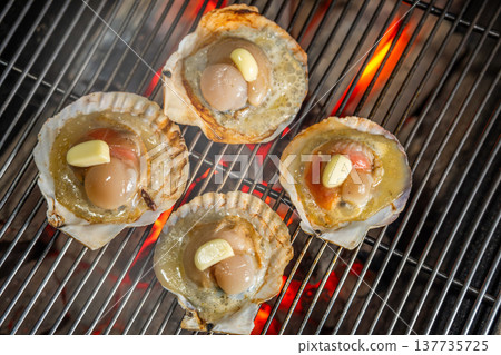 Grilled scallops over charcoal outdoors Grilled scallops over charcoal outdoors 137735725