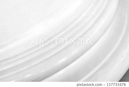 Close up of a white column base, enhancing architectural elegance Close up of a white column base, enhancing architectural elegance 137735876